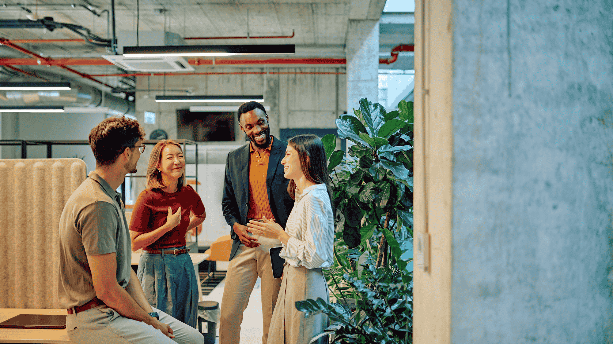 Image depicts payroll leaders discussing workday-native payroll integration